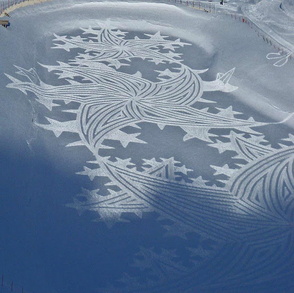 Масштабные рисунки на снегу